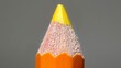  its graphite tip protruding from one end, a yellow ferrule tip extending from the other