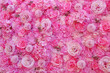 sweet pink artificial flowers background.
