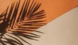 warm summer color background with tropical palm leaf shadow vibrant orange and beige paper texture with exotic plant shade summer layout minimal flat lay with botanical silhouette overlay