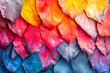 Rainbow of textured leaves abstract background