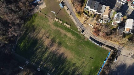 Wall Mural - Aerial top down of road and fall foliage in residential Pittsburgh Pennsylvania