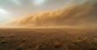 Massive dust storm rolling over a barren landscape