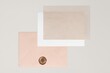 Pink wedding invitation card, envelope with wax seal