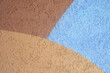Tricolor three colors modern wall in blue, brown and beige. Lovely plastered walls backgounds backdrop concept