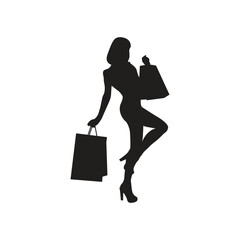 silhouette of a woman shopping