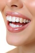 © STOCKYE STUDIO - woman mouth with healthy teeth isolated on a white background