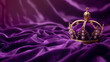 An elegant golden crown adorned with pearls rests on a luxurious purple velvet fabric, symbolizing royalty and opulence in a rich, textured setting.