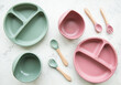 Collection of reusable colorful plastic dishes and bowls