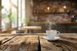 © ARM - A steaming cup of coffee on a rustic wooden table in a cozy café with soft morning light