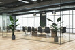 Contemporary glass meeting room interior with panoramic windows and city view, wooden flooring. 3D Rendering.