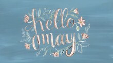 Hello May Lettering With Hand Drawn Flowers And Leaves On Blue Background.