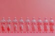 A group of soldier statue are walking in a colorful line in the style of cartoon models