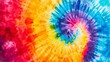 A colorful tie dye design with a rainbow swirl