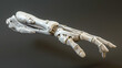 A white robotic hand with metal parts and wires
