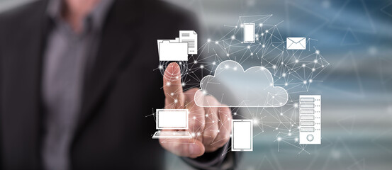 Wall Mural - man touching a cloud computing concept