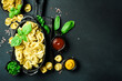 Homemade pelmeni, ravioli, dumplings. Top view. Italian traditional cuisine.