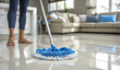 © Jean Isard - Woman Cleaning Floor With Mop