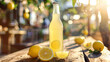 Bottle with fresh lemonade on wooden table 