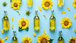 Bottles of sunflower oil on blue background