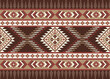 Seamless ethnic native pattern on brown background. Abstract vector illustration geometric shapes of squares, triangles and rectangular in brown, white and red.