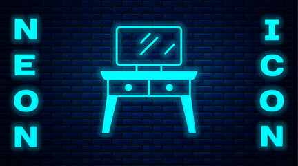 Poster - Glowing neon Dressing table icon isolated on brick wall background. Vector