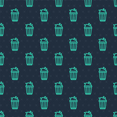 Canvas Print - Green line Popcorn in cardboard box icon isolated seamless pattern on blue background. Popcorn bucket box. Vector