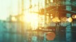 A blurred background captures a construction site bathed in the rays of the sun.