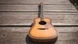 © Romaisa - A Vintage Style Acoustic Guitar On A Weathered Woo  2