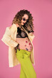 pregnant woman with curly hair and glasses, belly with floral pattern, bright clothes in pin up style