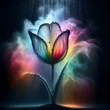 A translucent tulip in gradient rainbow colors with water droplets backlit by a dramatic play of light and shadow