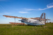 Abandoned old airplane on the field