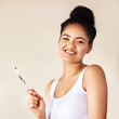 Smile, dental and portrait of woman with toothbrush in studio for morning hygiene routine for teeth. Happy, health and person with oral care product for plaque, gums and breath by white background.
