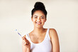 Smile, dental health and portrait of woman with toothbrush for morning hygiene routine in studio. Happy, clean and person with oral care product for plaque, gums and fresh breath by white background.