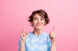 © deagreez - Photo of gorgeous nice lady look direct fingers up empty space ad blank isolated on pink color background