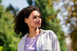 © deagreez - Photo of dreamy adorable lady wear white shirt smiling enjoying warm sunny weather outside urban city park