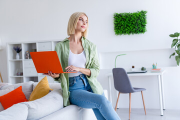 Wall Mural - Photo of dreamy cute lovely minded woman hold modern netbook work as it specialist from home white light room indoors