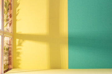 Wall Mural - Panorama de fond d'un mur jaune et vert pour création d'arrière plan. Jeu d'ombre et de lumière du soleil à travers une fenêtre avec des branches d'oliviers.	