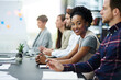 © peopleimages.com - African employee, smile portrait and meeting in boardroom, colleagues and learn. Businesswoman, office and workshop for collaboration, training and document or diversity, development and opportunity