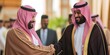 © Andrii  - Traditional Saudi Greeting: Handshake Between Men
