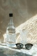 Refreshing Vision: Water Bottle and Glasses
