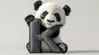 Cute panda bear sitting on top of a letter K, perfect for educational designs