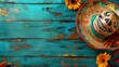 Mexican Sombrero With Sunflowers on a Blue Wooden Background