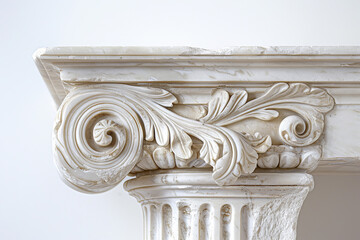 A white marble column with a leafy design on it