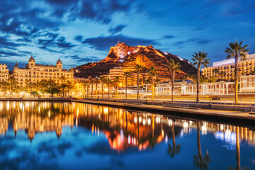 Illuminated Alicante Old Town Panorama at Dusk with Santa Barbara Castle and Harbor