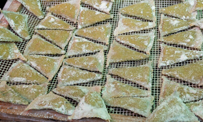 Wall Mural - Italian food, fresh homemade pasta filled with spinach ravioli ready to cook on Portobello road food market, London