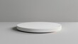 Simple and clean round white podium for showcasing small electronic devices, isolated backdrop