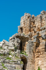 Wall Mural - Picturesque ruins of an amphitheater in the ancient city of Perge, Turkey. Perge open-air museum.