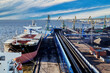 © grigvovan - Coal harbor at maritime dry bulk terminal, bulk carrier under loading.