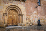 Fototapeta Uliczki - Church door of Nuestra Señora la Mayor with the statue of Leonor Izquierdo in the spanish city of Soria - autonomic province of Castilla y Leon