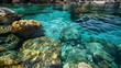 a serene and picturesque scene. The clear, turquoise water surrounded by rocks and the underwater stones visible through the transparent water create a tranquil atmosphere